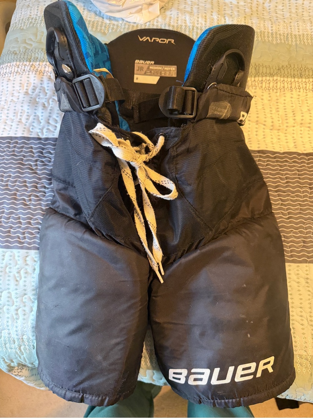 Bauer Vapor Youth Hockey Pants in Black with Blue Accents